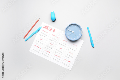 Calendar, pencils and clock...