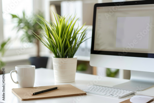 Modern Workspace with Job Posting on Computer Screen and Minimalist Office Supplies photo