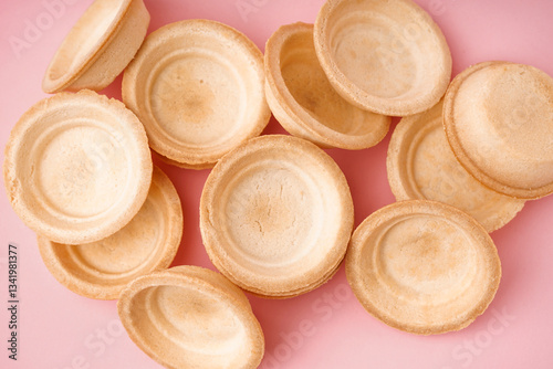 Homemade tartlets on pink b...