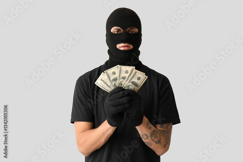 Male thief with dollar bank...