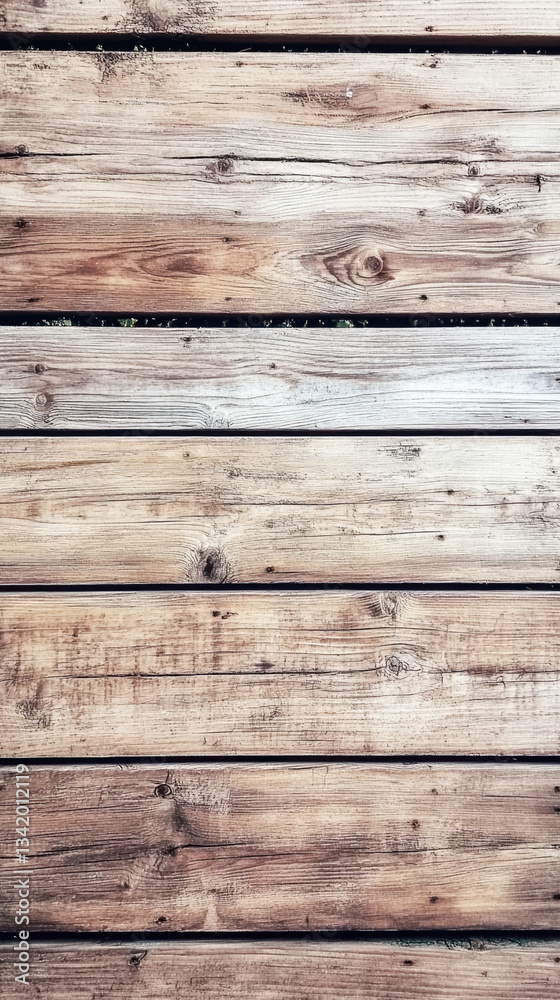 Naklejka premium Rustic wooden planks with weathered texture and natural grain patterns
