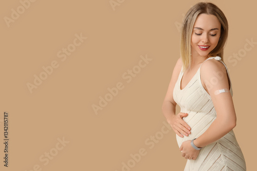 Young pregnant woman after ...