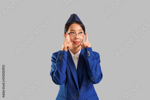 Young Asian stewardess wear...