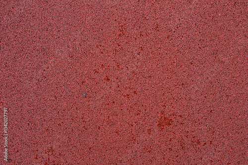 Wallpaper Mural red rubber coating on the ground with water droplets Torontodigital.ca