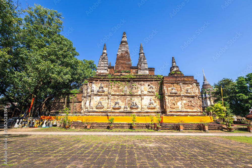 Wat Chet Yot or Wat Photharam Maha Wihan, seven pagoda temple It is a major tourist attraction in Chiang Mai, Thailand.with evening,Temple in Chiang Mai.