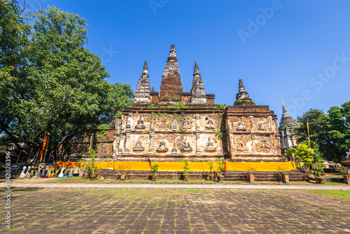 Obraz na płótnie Wat Chet Yot or Wat Photharam Maha Wihan, seven pagoda temple It is a major tourist attraction in Chiang Mai, Thailand.with evening,Temple in Chiang Mai. w salonie
