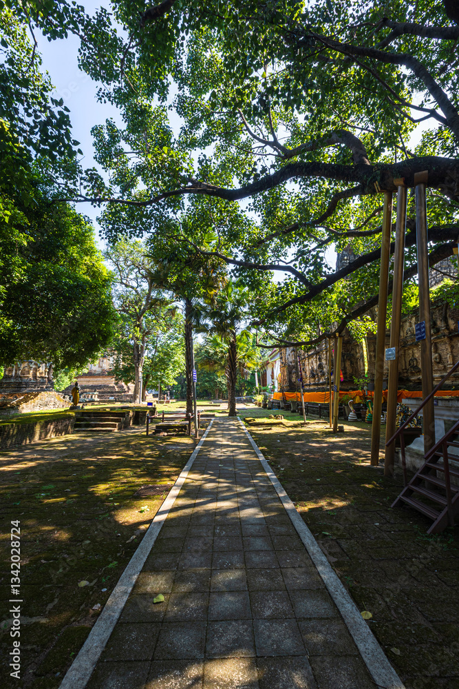 Wat Chet Yot or Wat Photharam Maha Wihan, seven pagoda temple It is a major tourist attraction in Chiang Mai, Thailand.with evening,Temple in Chiang Mai.