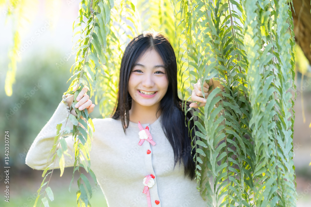 Portrait cute smiles Asian of attractive young teenage girl the cafe on vacation at a coffee shop in spring day