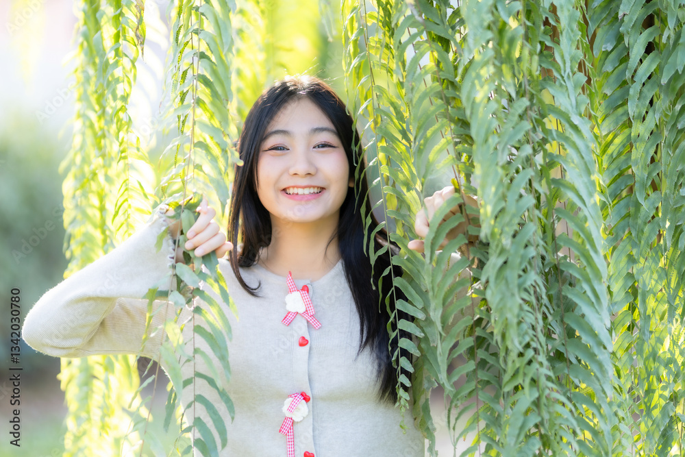 Portrait cute smiles Asian of attractive young teenage girl the cafe on vacation at a coffee shop in spring day