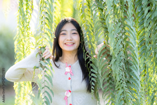 Obraz na płótnie Portrait cute smiles Asian of attractive young teenage girl the cafe on vacation at a coffee shop in spring day w salonie