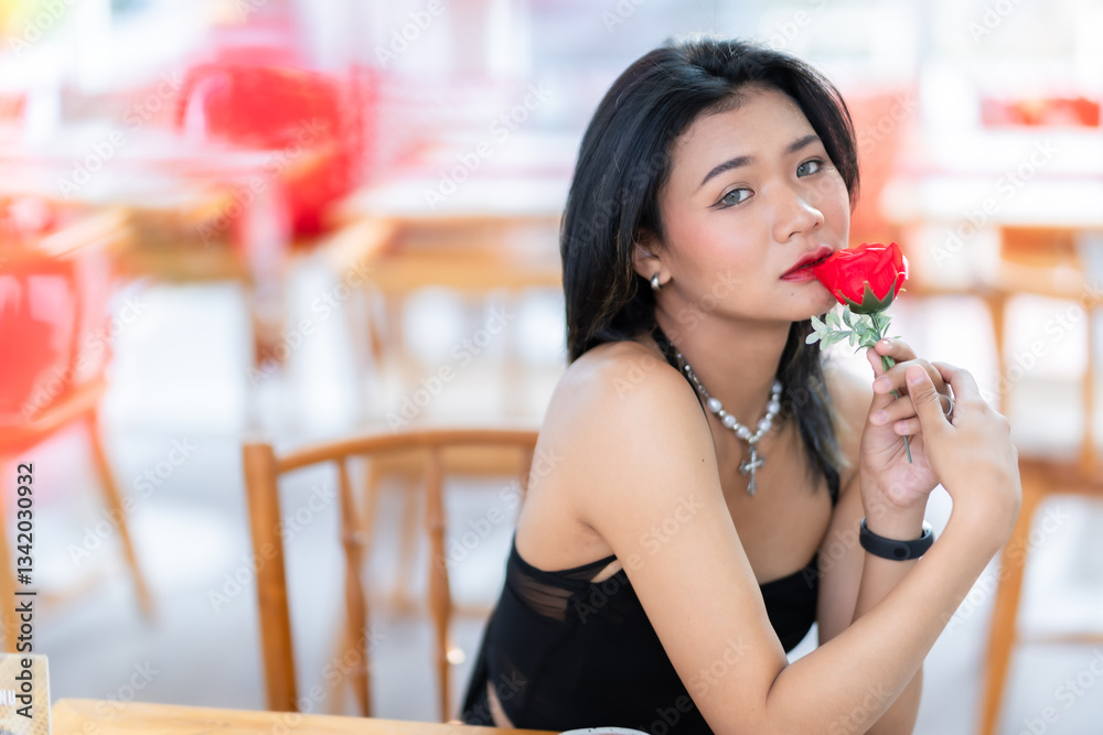 valentine's day, Portrait beautiful asian people woman fashion model in summer Black dress and coffee in cup holding bouquet of red roses in the living room inside or cafe
