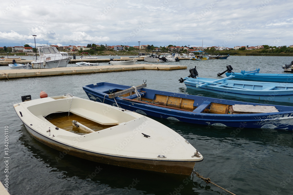 Nin, Croatia - September 13, 2024 - small boats in the port of Nin on a summer afternoon