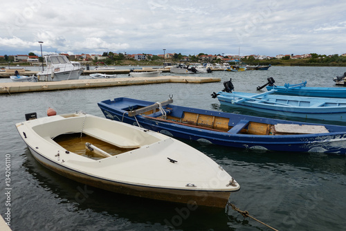 Obraz na płótnie Nin, Croatia - September 13, 2024 - small boats in the port of Nin on a summer afternoon w salonie