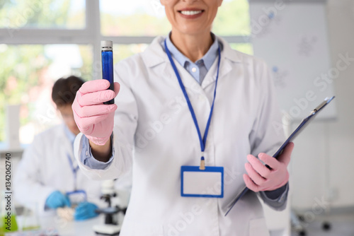 Female chemist with test tu...