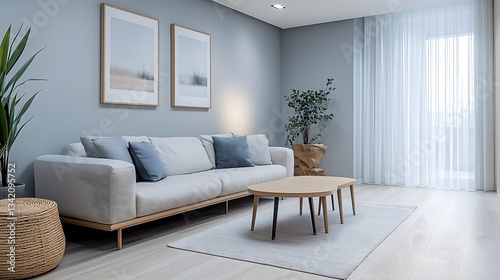 Cozy scandinavian living room featuring light laminate flooring and modern decor for a serene atmosphere