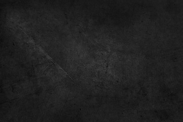 Dark grey textured concrete wall grunge black background