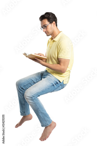 Passionate student sitting and reading a book	