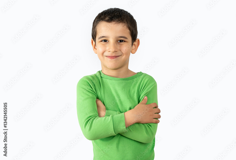 Child with wearing casual blue t-shirt over white background happy boy smiling with crossed arms looking at the camera. Positive person. Child with wearing casual blue t-shirt over white background happy boy smiling with crossed arms looking at the camera. Positive person.