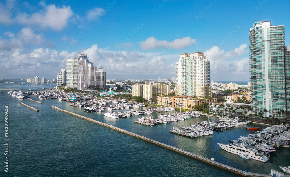 Obraz premium Miami south beach aerial view on luxury yacht marina with docked boat at sea