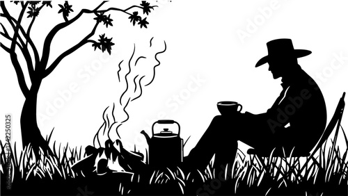 A cowboy’s silhouetteriding sitting around a campfire with a pot of coffee brewing beside him