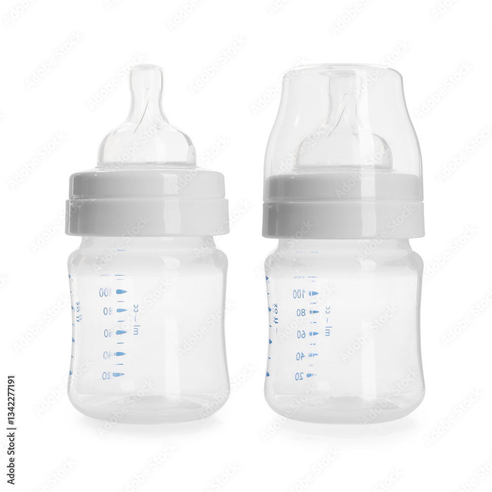 Two empty feeding bottles isolated on white Two empty feeding bottles isolated on white
