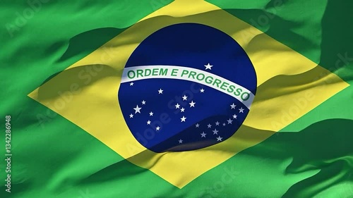 national flag of Brazil fluttering in strong wind, slow motion