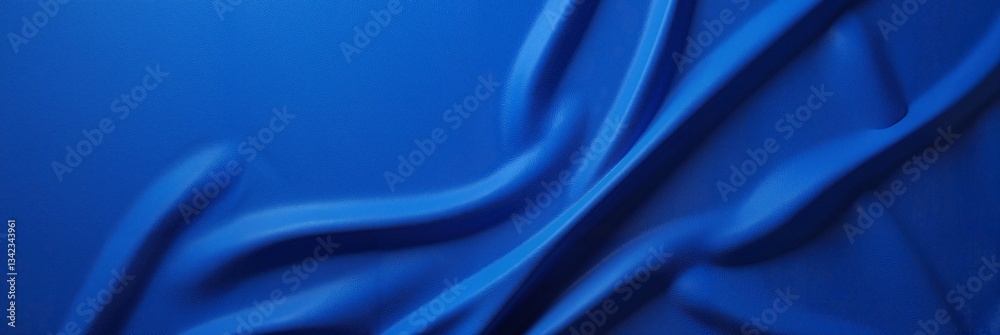 Fototapeta premium Abstract blue wave patterns on a textured surface creating a modern and dynamic backdrop, conceptual design for technology or creative industries.
