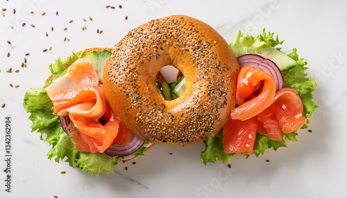 lox bagel a sandwich with smoked salmon and fresh vegetables on a white background overhead flat lay shot with sesame seeds