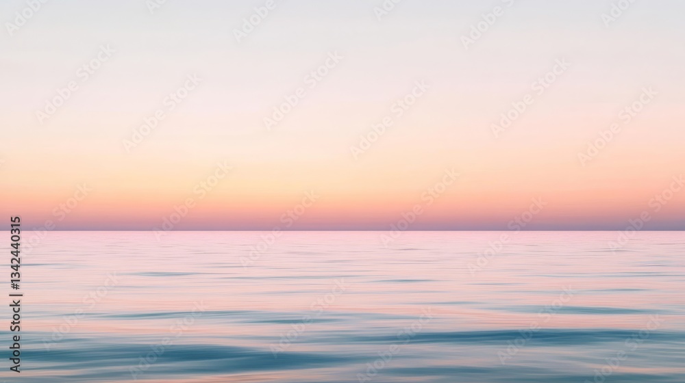 Obraz premium Imagine a tranquil scene featuring a softly blurred sunset sky where gentle pink gradients beautifully merge with the calm ocean below, evoking deep feelings of serenity, peace, and relaxation