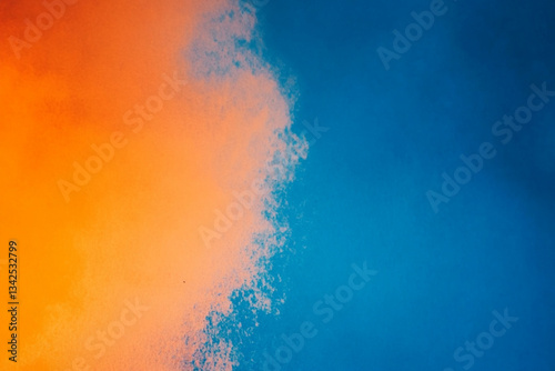 Smoke is rising from a blue and orange cloud