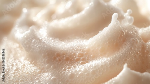 A luxurious face cleansing mousse sample, its creamy texture promising a gentle yet deep clean, nestled alongside a cloud of soap foam, a testament to the art of skincare.