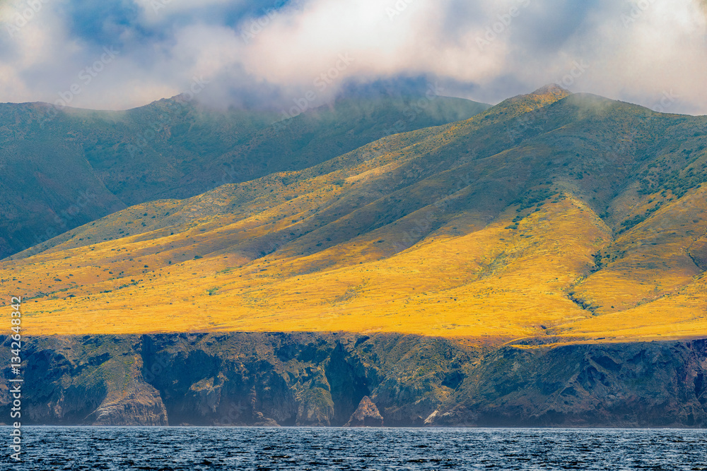 Striking dramatic skies hang over the coastal shores of the Channel Islands during a colorful Springtime day