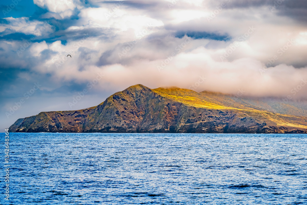 Striking dramatic skies hang over the coastal shores of the Channel Islands during a colorful Springtime day