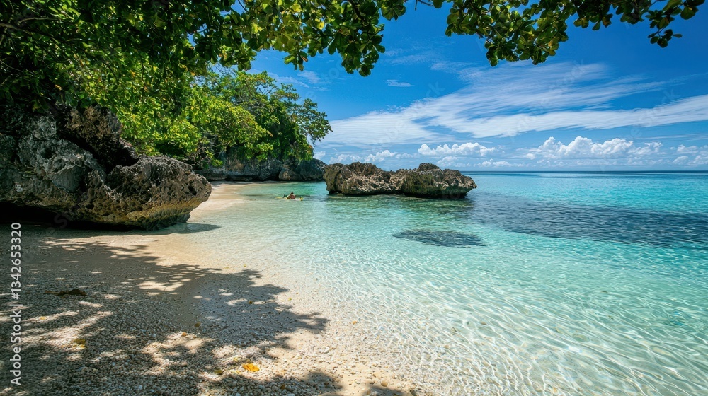 Obraz premium Secluded Bay with Crystal Clear Water and Rocky Outcrops