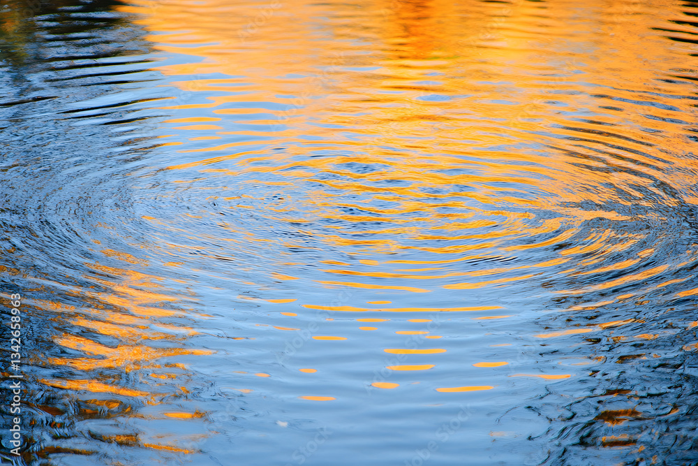 Water Reflections: Golden Hues on Blue Water Reflections: Golden Hues on Blue