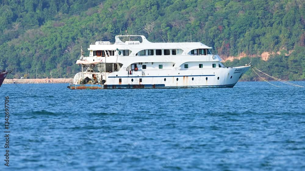 Luxury Yacht Cruising Near Phuket's Scenic Coastline Luxury Yacht Cruising Near Phuket's Scenic Coastline