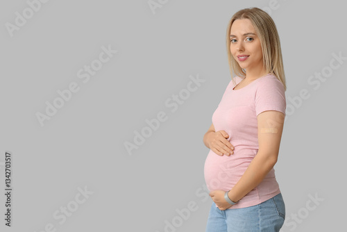 Young pregnant woman after ...
