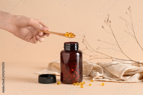 Female hand with bottle of ...