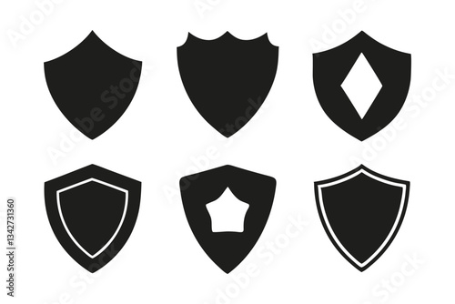 A set of silver shield icons, emblems of heraldic protection