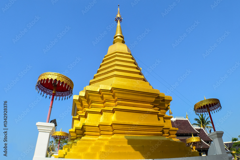 Fototapeta premium Pagoda and Chapel, Lanna Architecture, Symbols of Buddhism, South East Asia at San Pu Loei Saleewiangkaew Temple, Chiang Mai, Northern Thailand