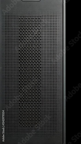 Modern black speaker stands out with a sleek design and intricate mesh detail, ideal for contemporary interiors and music lovers