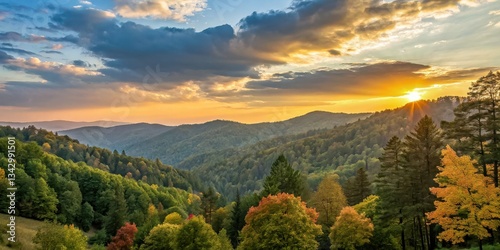 Experience the breathtaking beauty of the Great Smoky Mountains at sunrise. This stunning Tennessee mountain scene showcases the vibrant autumn foliage in all its glory.