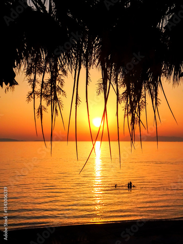 Fototapeta Naklejka Na Ścianę i Meble -  Beach sunset. Romantic beach sunset. Sunset on the beach.