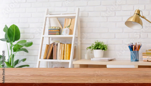 Cropped shot of wooden table with copy space in blurred study room
