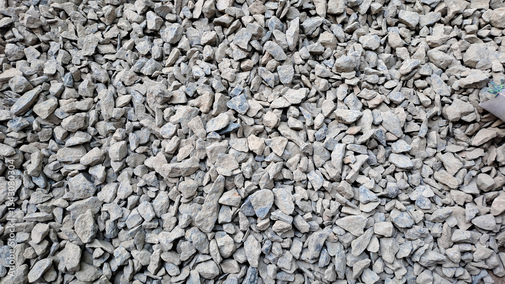 Gravel texture or gravel background for design. Real grunge texture background and small stone.Top view of ground gravel road. selective focus.
Gravel texture or gravel background for design. Real grunge texture background and small stone.Top view of ground gravel road. selective focus.