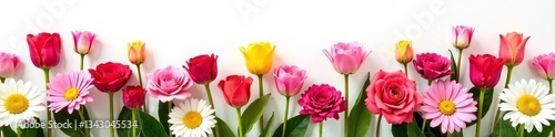 Vibrant bouquet of assorted flowers; roses, tulips, daisies on white backdrop, floral arrangement, still life