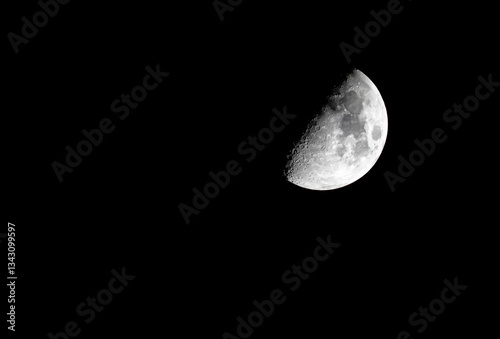 Half Moon Detailed Close-Up Against a Black Sky
