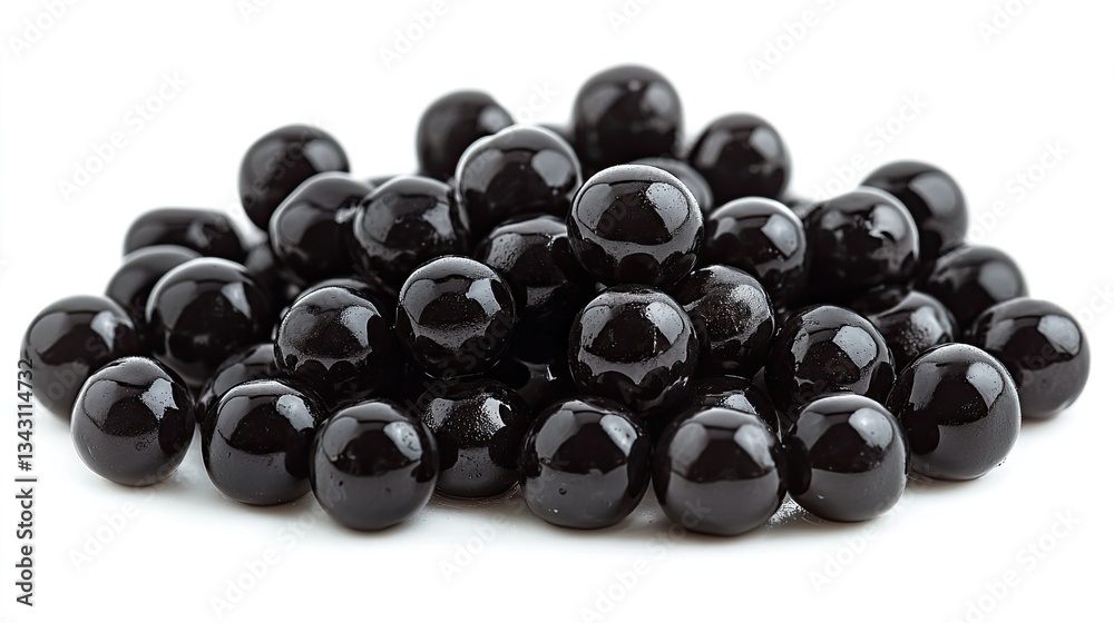 Pile of black tapioca boba pearls, representing trendy bubble tea, modern beverages, and culinary creativity, perfect for food photography, modern drink culture, or casual dining themes. Pile of black tapioca boba pearls, representing trendy bubble tea, modern beverages, and culinary creativity, perfect for food photography, modern drink culture, or casual dining themes.