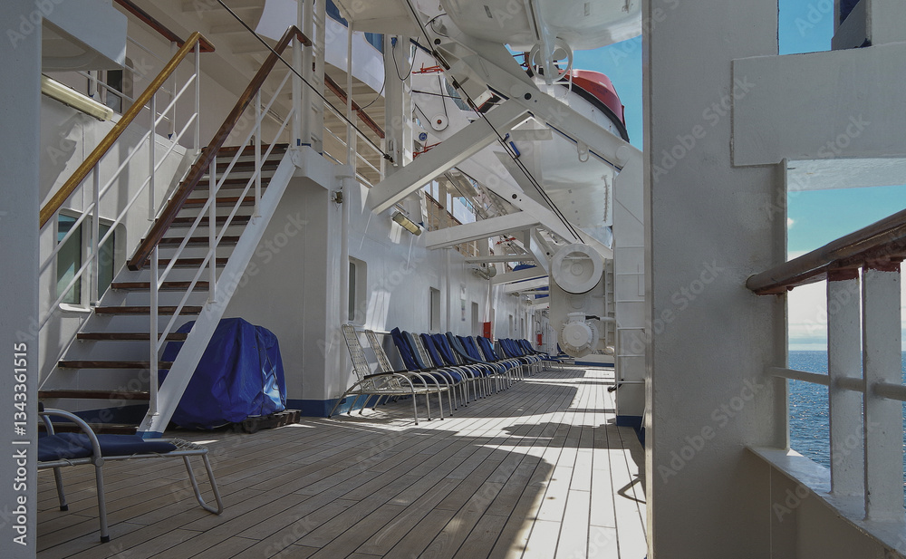 Outdoor balcony terrace veranda deck patio with aluminium chairs sun loungers onboard classic cruiseship cruise ship liner