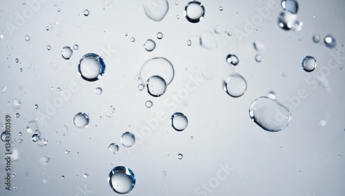 Wallpaper Mural Bubbles Ascending: A collection of transparent bubbles floats effortlessly against a soft, serene background, their delicate forms catching the light and creating a sense of purity and freshness. Torontodigital.ca